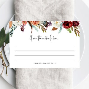 May include: A printable Thanksgiving card with a floral border in shades of red, white, and green. The card says "I'm thankful for..." and "Friendsgiving 2019".