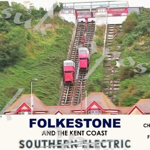 May include: A vintage travel poster advertising the Folkestone and Kent Coast Southern Electric railway. The poster features a red and white train on a steep incline with the text "Folkestone and the Kent Coast Southern Electric" in blue and white.