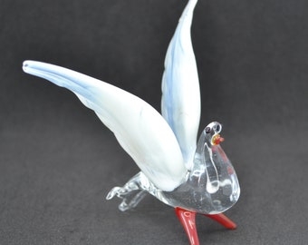 リングに飾られたガラスの鳩の置物、コレクター向けのガラスの鳩