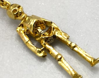 9ct Solid gold novelty moving articulated skeleton Pendant skull and bones charm 