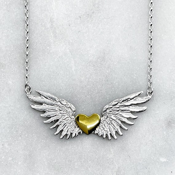 Sterling silver heart hotsell with wings pendant
