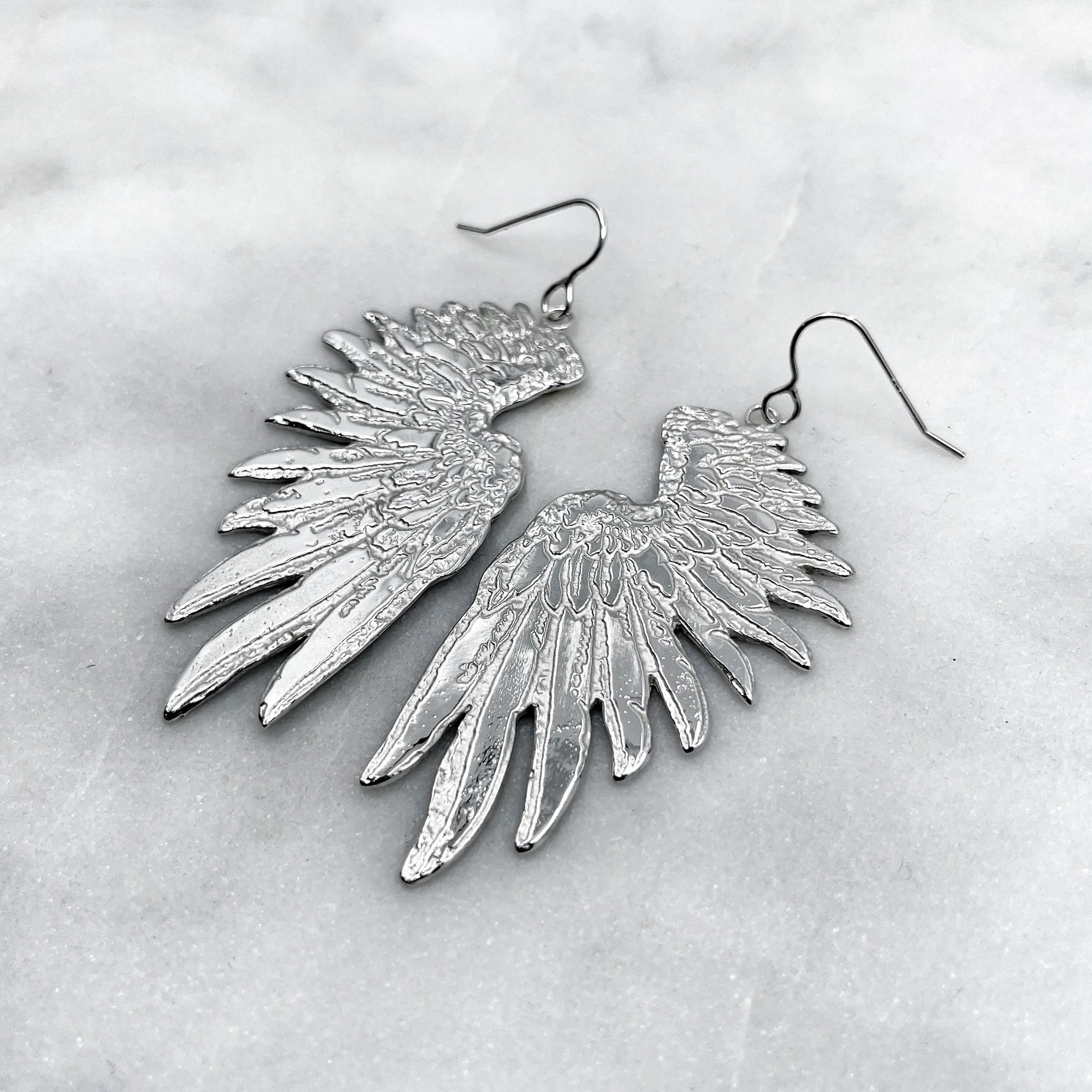Angel wing hotsell earrings argos