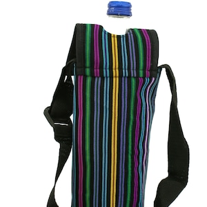 May include: A black and colorful striped fabric water bottle holder with a black adjustable strap. The holder is designed to fit a standard-sized water bottle.