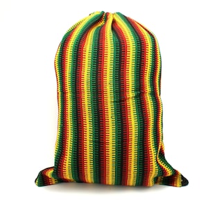 May include: A striped drawstring bag with red, yellow, and green stripes. The bag is made of a woven fabric and has a drawstring closure.