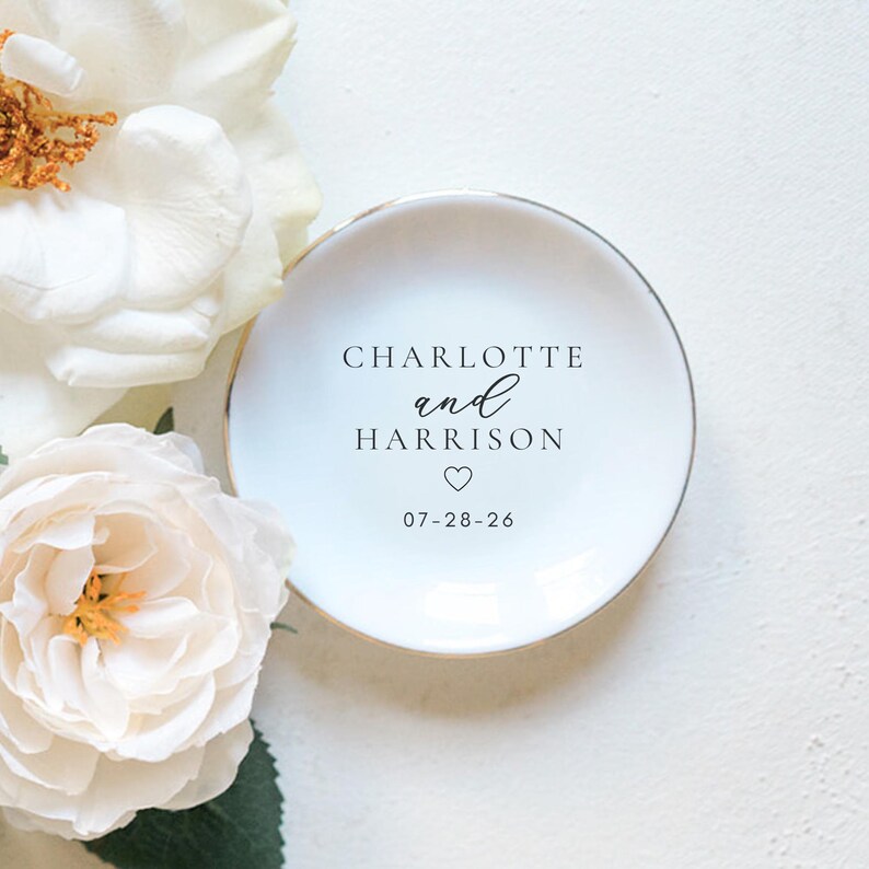 names and dates— personalized bridal ring dish, proposal gift, and bridesmaid jewelry tray.”

“Elegant ceramic trinket dish for wedding rings — personalized engagement keepsake for couples.”

names and dates — personalized bridesmaid ring dish, wedding day gift, or engagement present.”
