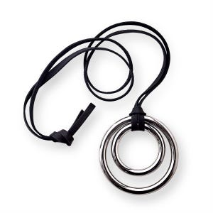 May include: A black leather cord necklace with a silver double ring pendant.