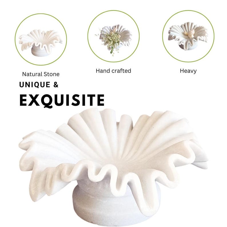 May include: A white marble bowl with a unique, ruffled design. The bowl is hand-crafted and heavy. Natural Stone UNIQUE & EXQUISITE