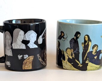 Set of 2 "Henry VII Disappearing Wifes" and "Great Nudes" Heat Changing Ceramic Mugs by "The Unemployed Philosophers Guild"