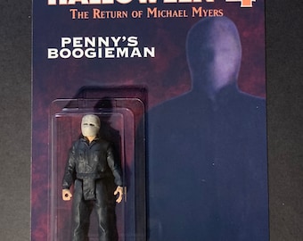 May include: A plastic action figure of Michael Myers from the movie Halloween 4: The Return of Michael Myers. The figure is wearing a black jumpsuit and a white mask. The figure is packaged in a plastic blister pack with a cardboard backing. The backing features the title "Halloween 4: The Return of Michael Myers" and the tagline "Penny's Boogeyman".