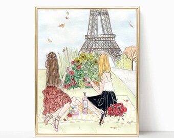 May include: Two women enjoying a picnic in front of the Eiffel Tower. They are seated on a blanket with a bottle of wine, snacks, and flowers. The Eiffel Tower is in the background, and there are trees and leaves on the ground.