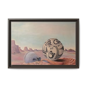 May include: A painting of a desert landscape with two Native American pottery vessels. The larger vessel is white with black geometric designs and is sitting on a rock. The smaller vessel is blue and white and is lying on the ground. The background is a hazy desert landscape with red rock formations.