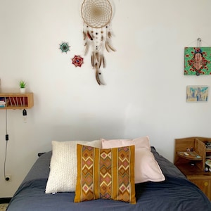 Embroidered cushion