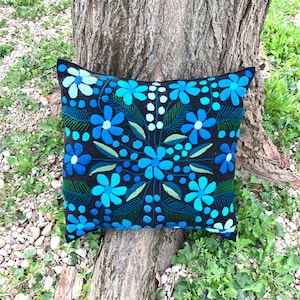 Embroidered cushion