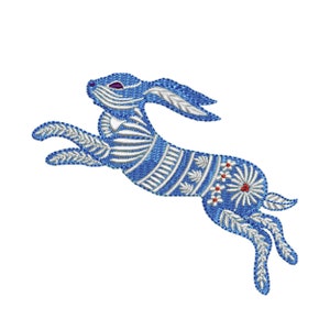 May include: A blue and white embroidered design of a leaping hare with red flower accents.