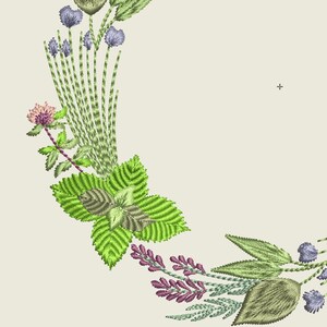 May include: Embroidered design featuring a wreath of green leaves, purple flowers, and pink clover blossoms.