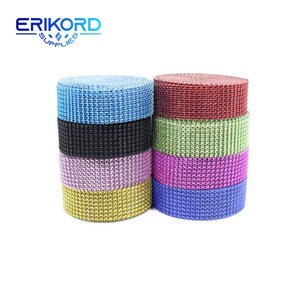 May include: Assortment of six rolls of sparkly, iridescent ribbon in various colors, including blue, red, green, purple, gold, and black. The ribbon is made of a diamond-shaped mesh material.