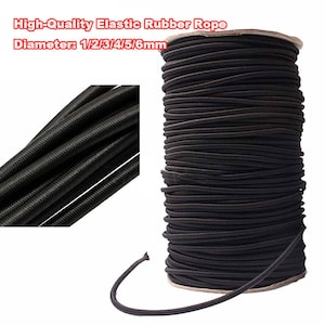 May include: A spool of black elastic rubber rope. The rope is wound tightly around a cardboard core. The rope is available in various diameters, including 1/2, 3/4, 5, and 6 mm.