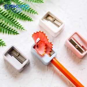 Mini sacapuntas de plástico para lápices, máquina de corte de lápices estándar de Color caramelo, papelería para escuela y oficina, duradera, nueva