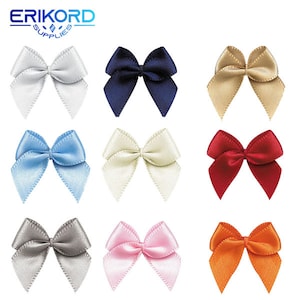 May include: Assortment of ten small satin bows in various colours, including white, navy blue, beige, light blue, ivory, red, grey, pink, and orange. The bows are arranged in three rows of three, with one bow in the centre row.