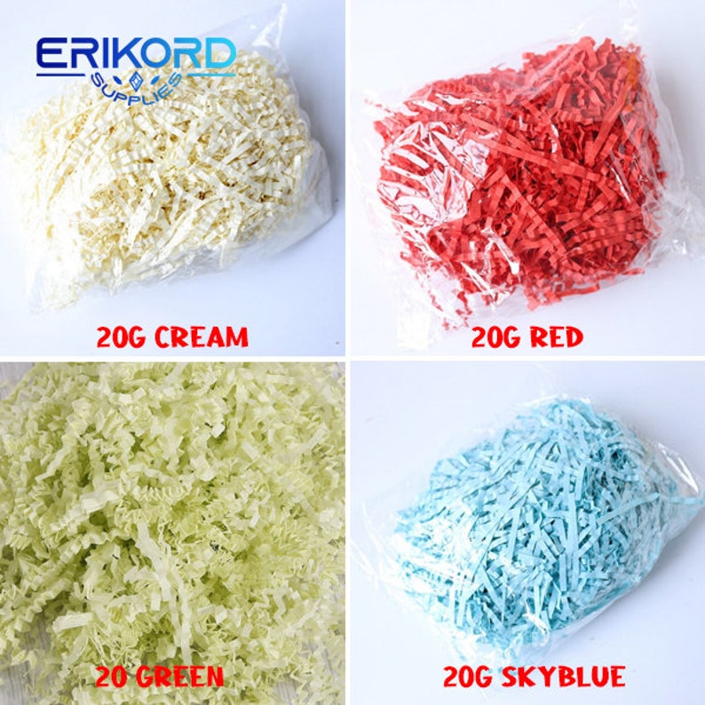 May include: Four bags of shredded paper in different colours: cream, red, green, and sky blue. Each bag contains 20 grams of paper.