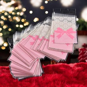 50 pezzi 7*10 cm/7*7 cm carino fiocco rosa design torta regalo confezioni sacchetti di plastica caramelle biscotti biscotti sacchetti matrimonio festa battesimo forniture