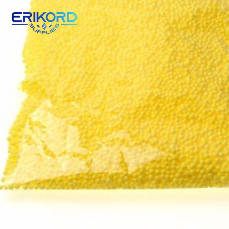 May include: A close-up of a bag of yellow packing peanuts. The peanuts are small and round, and they are perfect for protecting fragile items during shipping.