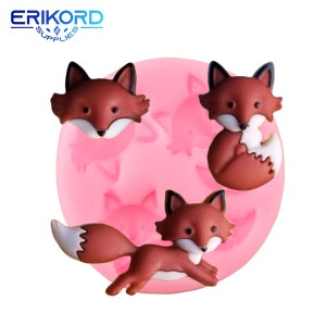 Puede incluir: Molde de silicona rosa con cuatro formas de zorro. El molde está diseñado para crear pequeñas decoraciones con forma de zorro para pasteles u otros postres.