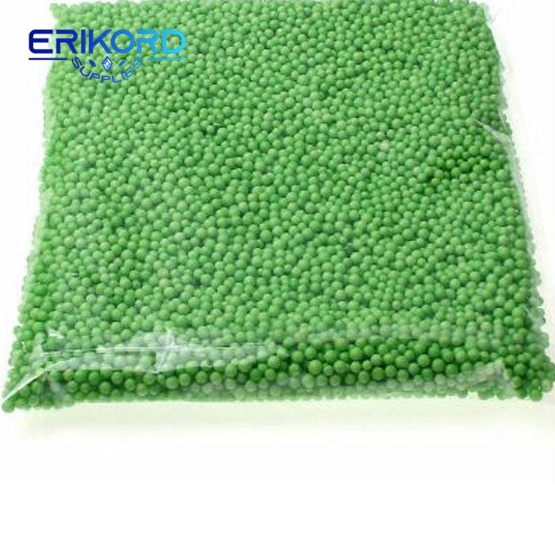 May include: A clear plastic bag filled with small, bright green foam balls. The bag is sealed and ready to be used.