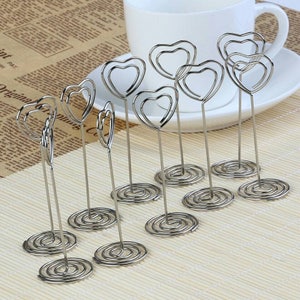 10 Uds. Portatarjetas en forma de corazón, Clips para recuerdo de fiesta de boda, soporte para números de mesa, acero inoxidable, envío gratis a todo el mundo
