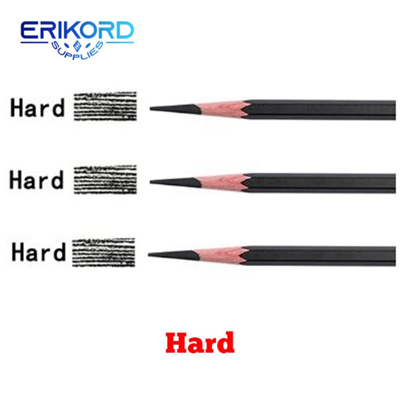 May include: Three black pencils with pink erasers and the word "Hard" written in black on the side of each pencil. The pencils are lined up vertically with a sample of the graphite line each pencil makes underneath each pencil.
