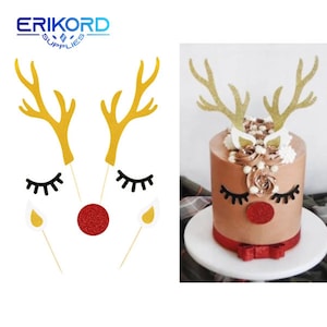 Puede incluir: Un conjunto de adornos para tartas de reno para una tarta con temática navideña. El conjunto incluye dos cuernos de reno dorados con purpurina, dos pestañas negras, una nariz roja con purpurina y dos adornos para velas amarillas con purpurina.
