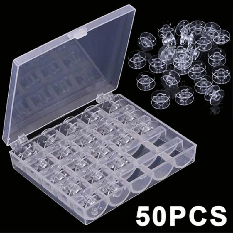 May include: A clear plastic storage box with a lid, containing 50 clear plastic bobbins for a sewing machine. The box has 25 compartments for the bobbins.  50PCS