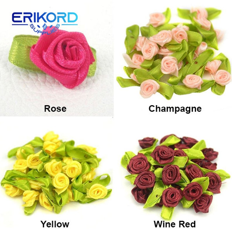 May include: Assortment of small, handmade fabric rose embellishments in four colors: rose, champagne, yellow, and wine red. Each rose is attached to a green leaf.
