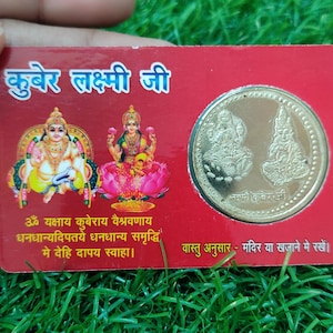 Cartão ATM com moeda de ouro Shri Kuber Laxmi recebe a bênção do deus da riqueza no hinduísmo