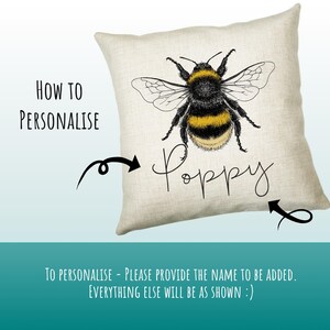 May include: A white pillow with a black and yellow bee illustration and the word "Poppy" written in cursive. The text "HOW TO PERSONALISE" is visible in the top left corner of the image. The text "TO PERSONALISE - PLEASE PROVIDE THE NAME TO BE ADDED. EVERYTHING ELSE WILL BE AS SHOWN :)" is visible at the bottom of the image.