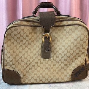 Used Brown Gucci GG Crystal Duffle Bag Houston,TX