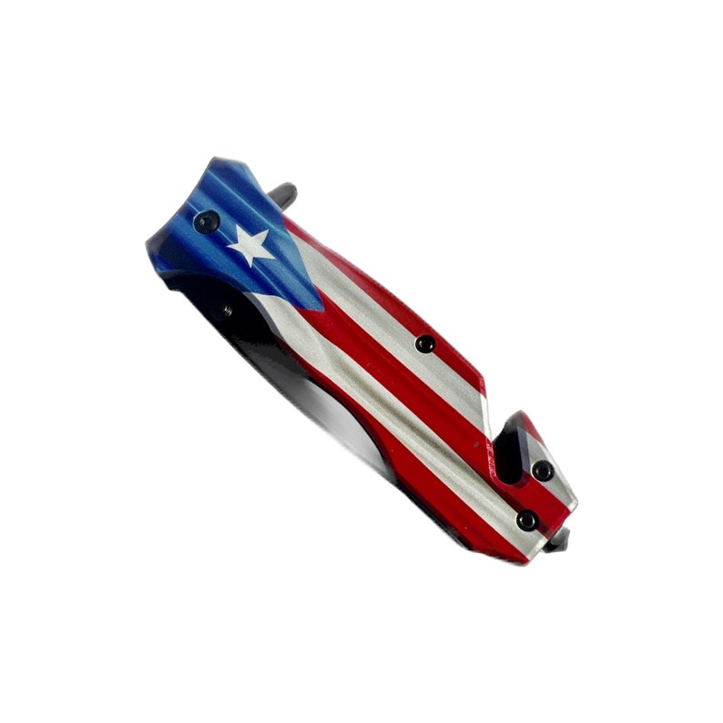 May include: A silver pocket knife with a red, white, and blue Puerto Rican flag design on the handle.