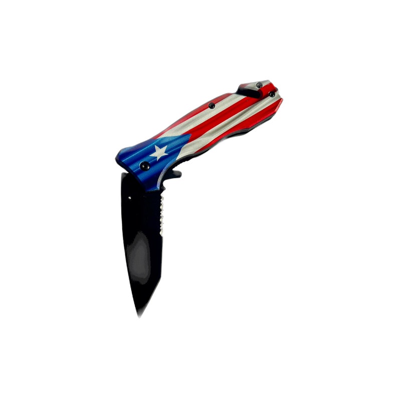 May include: A folding pocket knife with a black handle and a stainless steel blade. The handle is decorated with the flag of Puerto Rico, featuring red, white, and blue stripes with a white star.