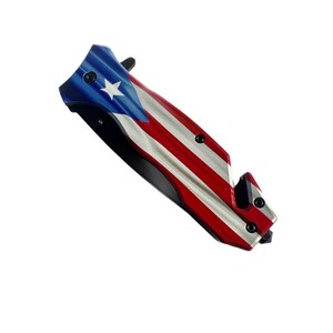 May include: A red, white, and blue pocket knife with a Puerto Rican flag design on the handle.