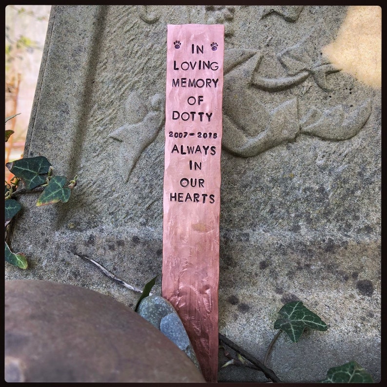 Personalised hand stamped pet memorial grave marker.