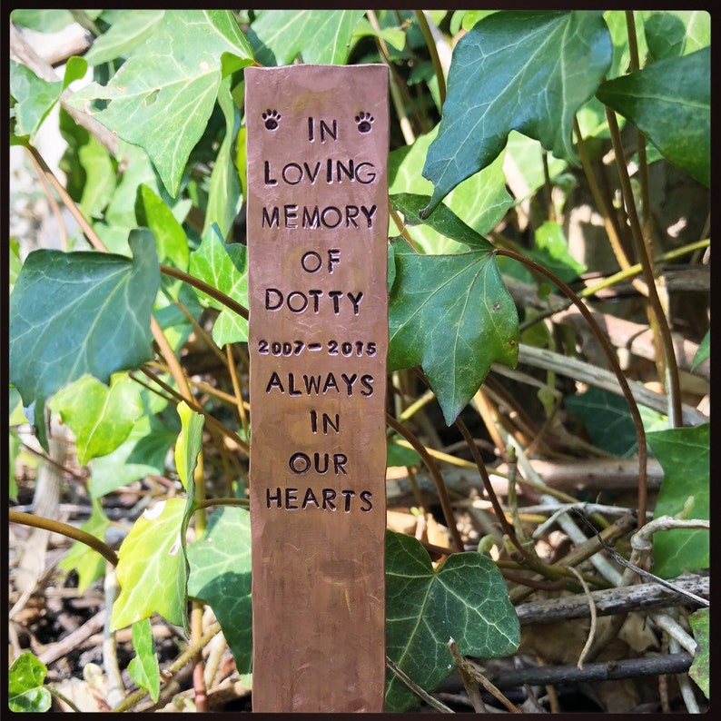Personalised hand stamped pet memorial grave marker.