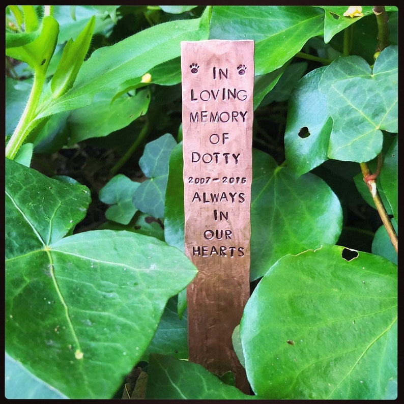 Personalised hand stamped pet memorial grave marker.
