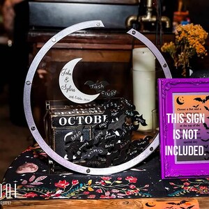 Acrylic Halloween guest book with bat-shaped pieces – a gothic wedding keepsake.