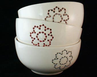 Handmade white ceramic bowl with copper wire embroidered flower