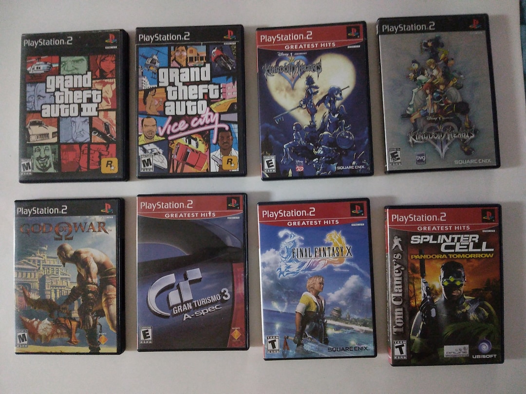 SALE PRICED Sony Playstation 2 PS2 DVD Game Bundle With Cases and