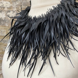 bold unique tassel upcycled recycled bicycle innertube black necklace bib necklace by laura zabo