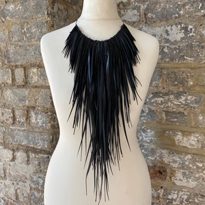 extra long tassel fake leather rubber black bold necklace by laura zabo