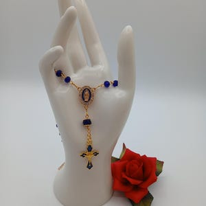 X*Cobalt Blue Crystal Car Rosary with Blue Enamel Cross & Rhinestone Surrounded Mother Mary Centerpiece