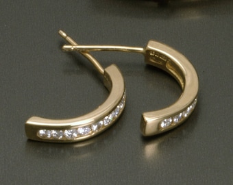 Infinity Collection diamond half hoop earrings  by John Fox