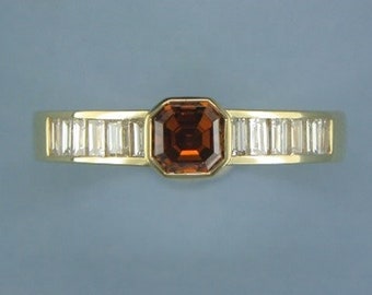 Octagonal natural cognac diamond ring supported white diamonds by John R Fox